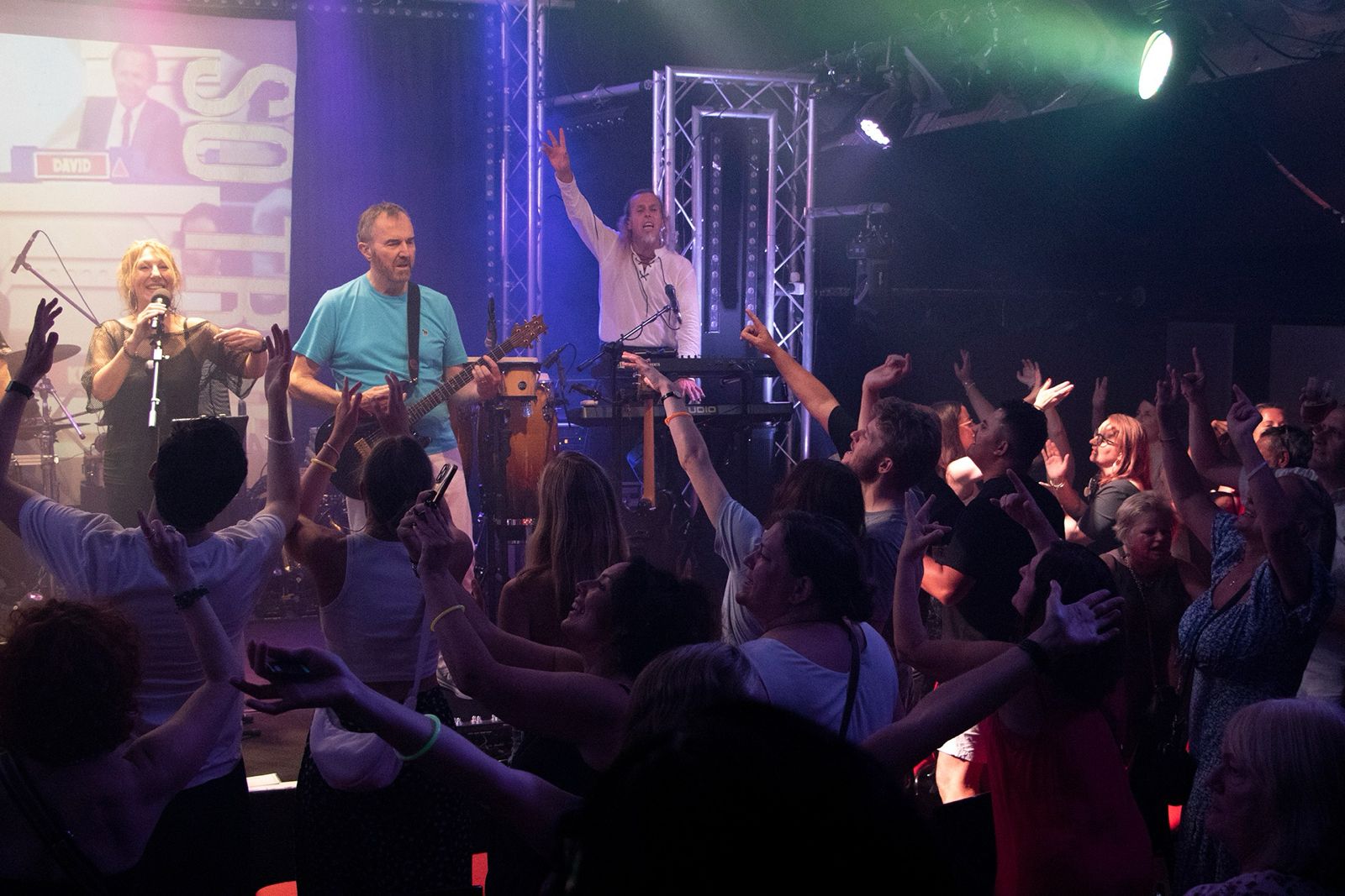 Packed dance floor at an 80s Party Night featuring So True live band